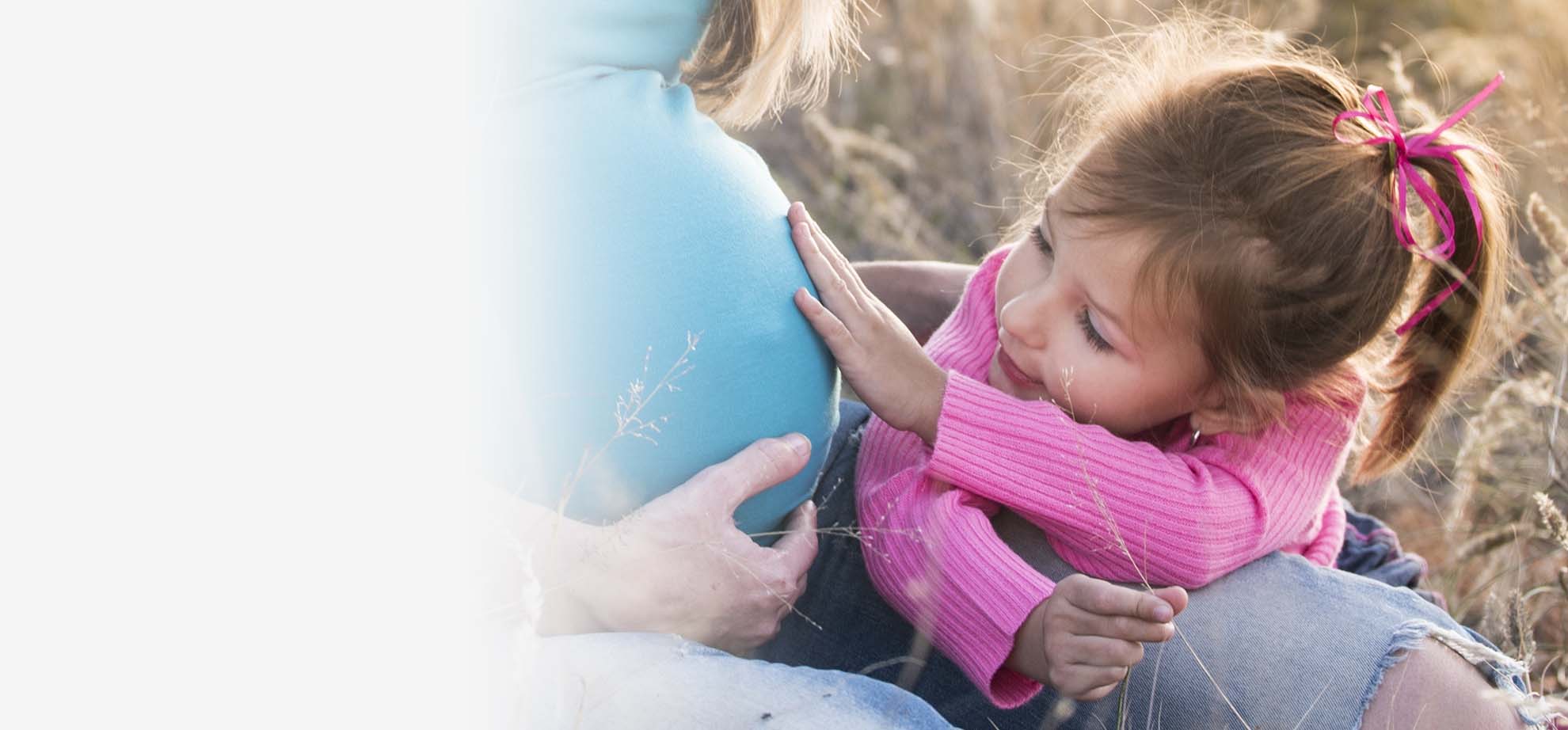 Family and pregnancy imagery from Acupuncture Associates’ official website